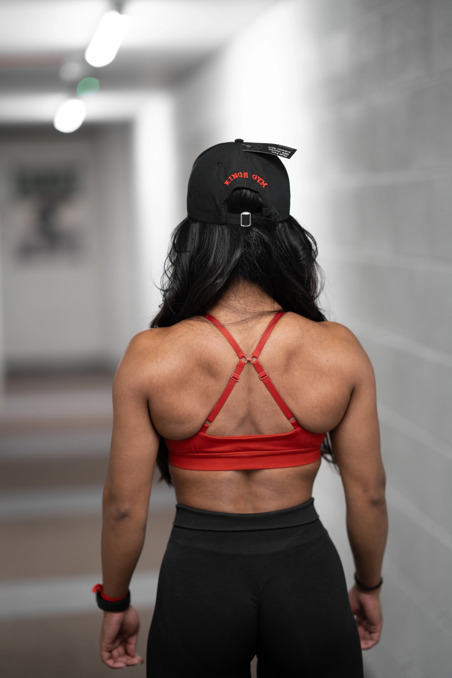 KingsGym Cool Red Cap from behind On Lady