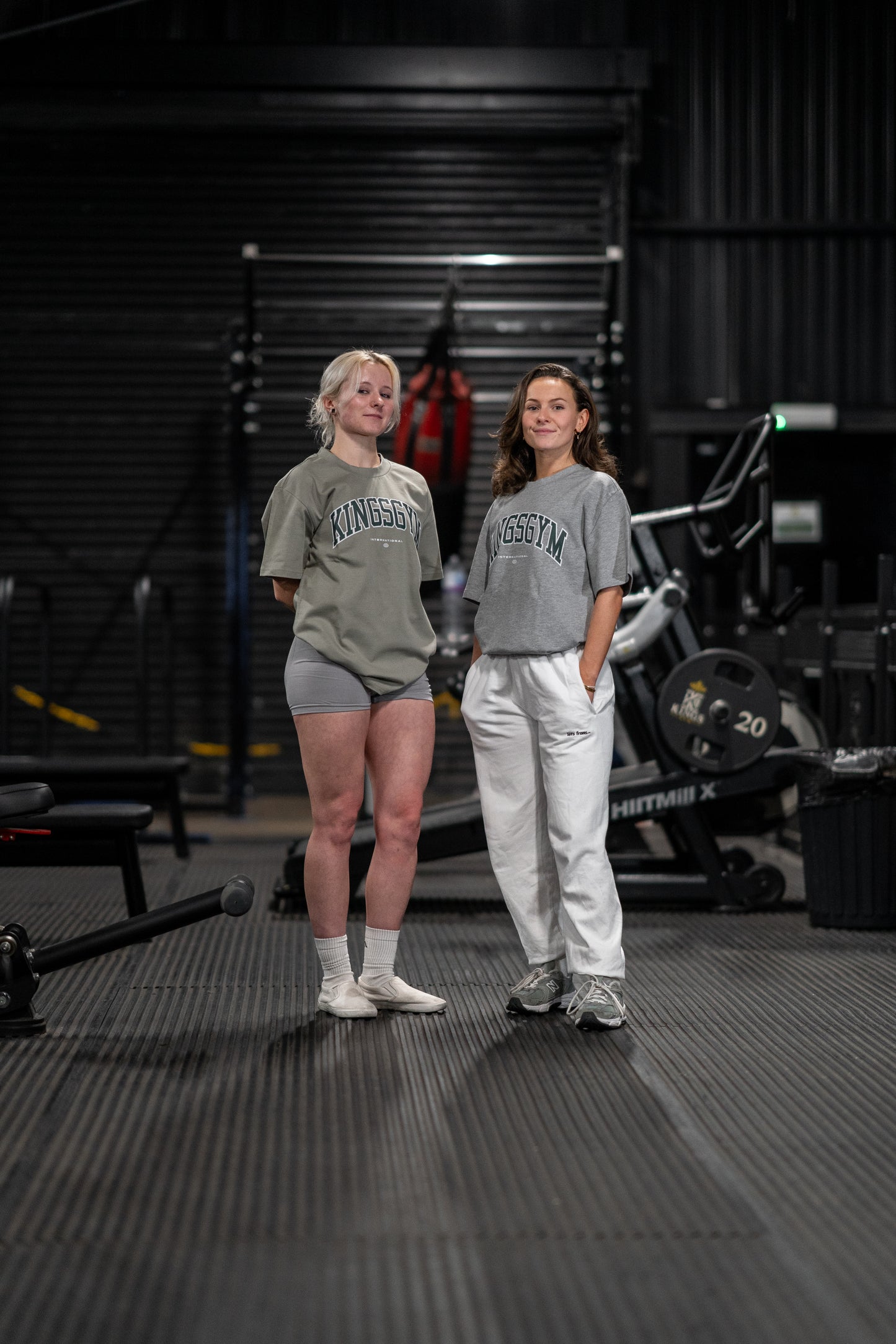 2 girls with International Range Tshirt front with Grey and Sage colours