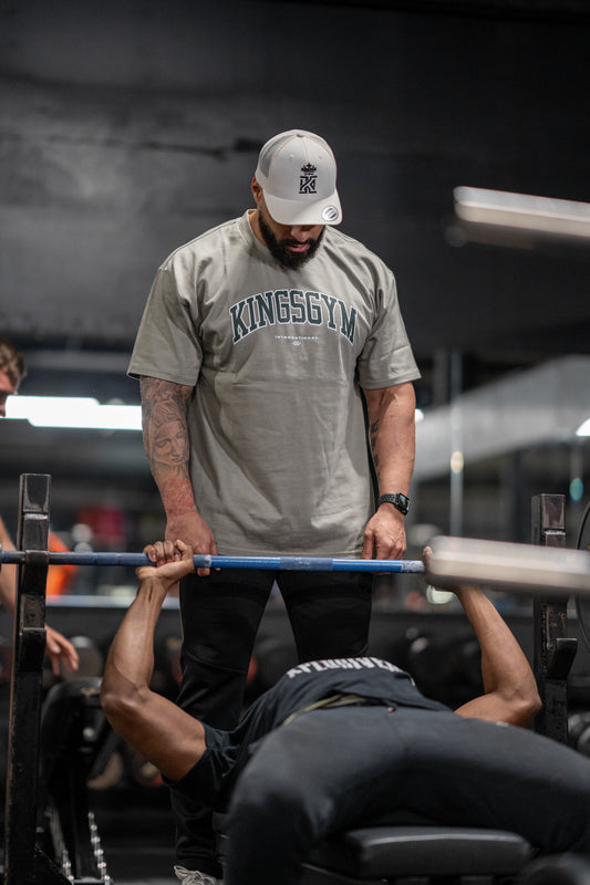 Man with Sage International Range Tshirt  in gym